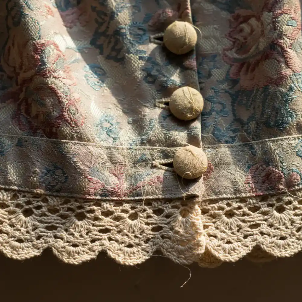 Close up details of vintage garment construction and fabric textures
